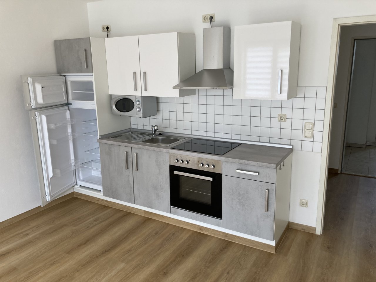Ab 01.08.26! 1-Raum WE mit Balkon, Einbauküche und Tiefgaragenstellplatz in ruhiger Seitenstraße