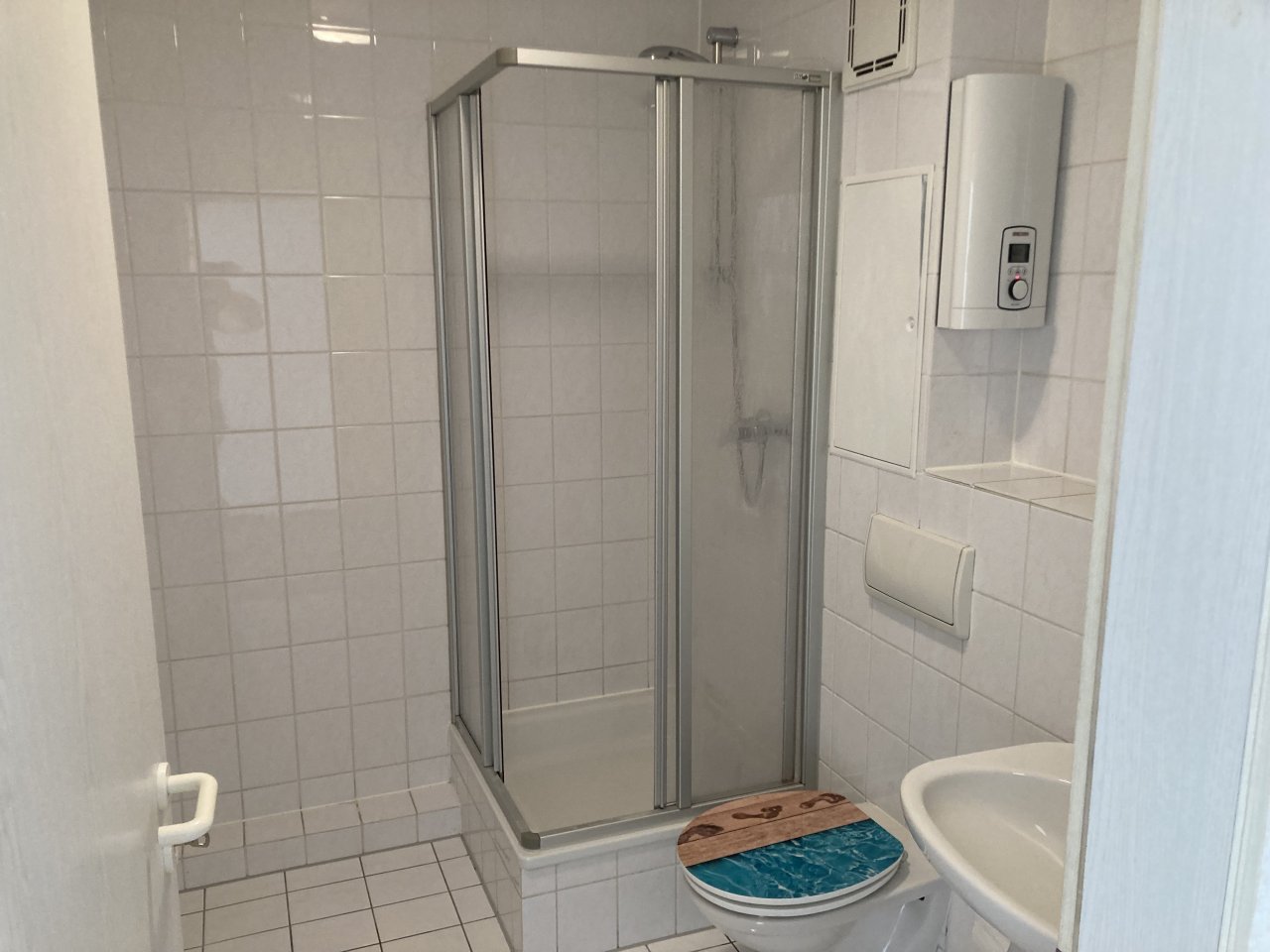 Ab 01.08.26! 1-Raum WE mit Balkon, Einbauküche und Tiefgaragenstellplatz in ruhiger Seitenstraße