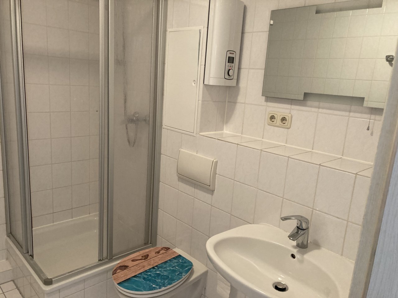 Ab 01.08.26! 1-Raum WE mit Balkon, Einbauküche und Tiefgaragenstellplatz in ruhiger Seitenstraße