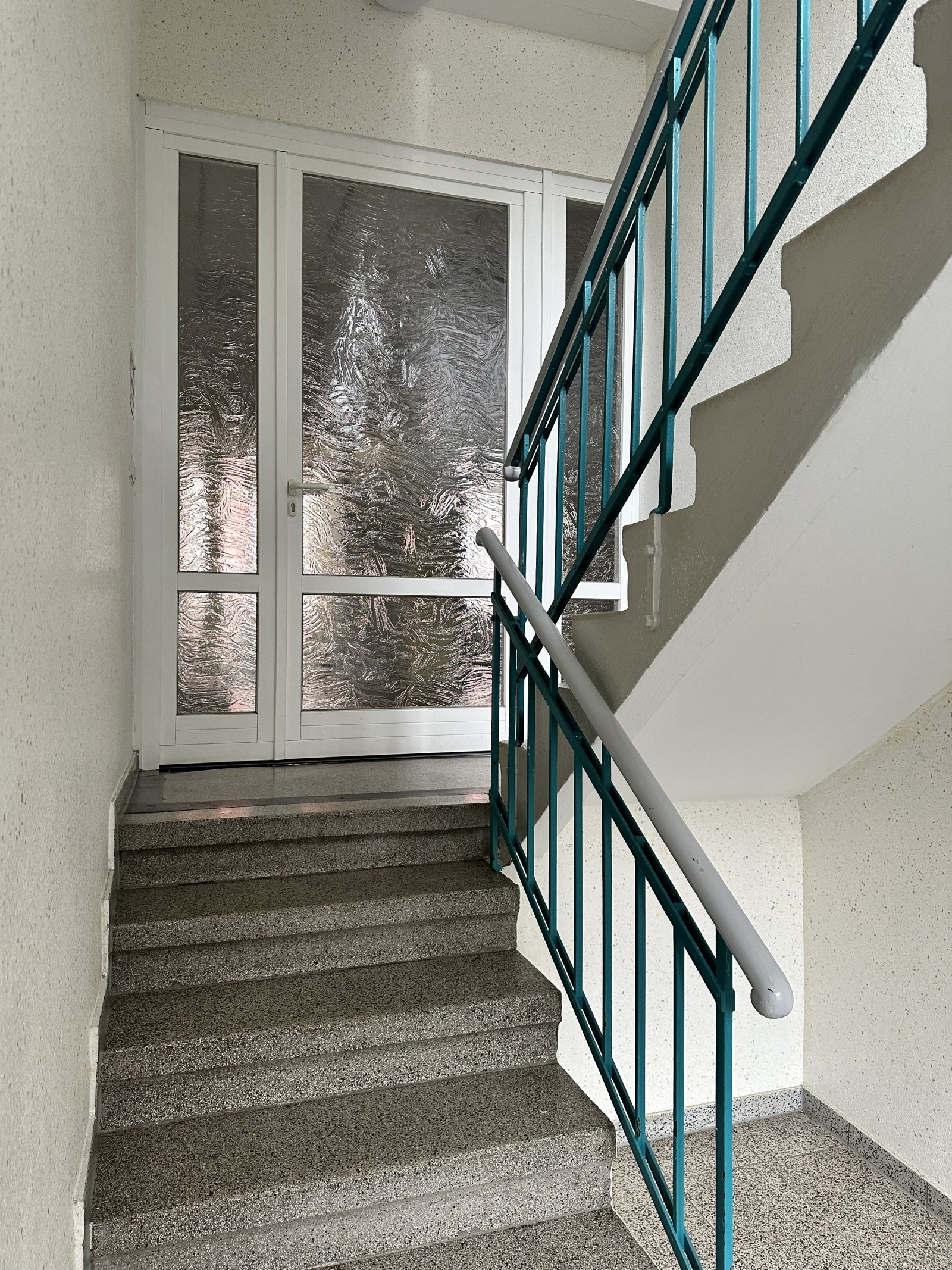 Treppenaufgang zu Praxis 1.OG